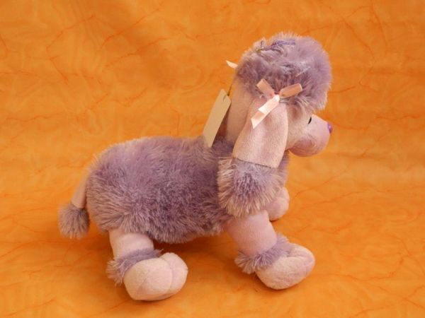 Stofftier Pudel lila